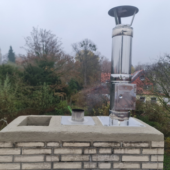 Kamin Abschluss mit Edelstahlrohr